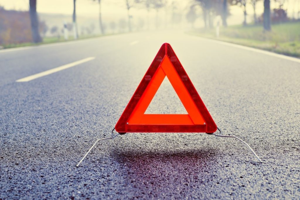 place a warning sign on the road, a safety protocol for movers