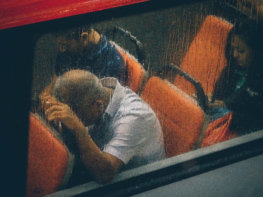 stressed out man on a train
